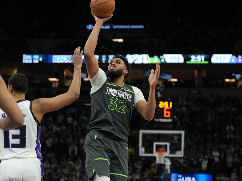 MINNEAPOLIS, MN -  MARCH 1: Karl-Anthony Towns #32 of the Minnesota Timberwolves drives to the basket during the game against the Sacramento Kings on March 1, 2024 at Target Center in Minneapolis, Minnesota. NOTE TO USER: User expressly acknowledges and agrees that, by downloading and or using this Photograph, user is consenting to the terms and conditions of the Getty Images License Agreement. Mandatory Copyright Notice: Copyright 2024 NBAE (Photo by Jordan Johnson/NBAE via Getty Images)