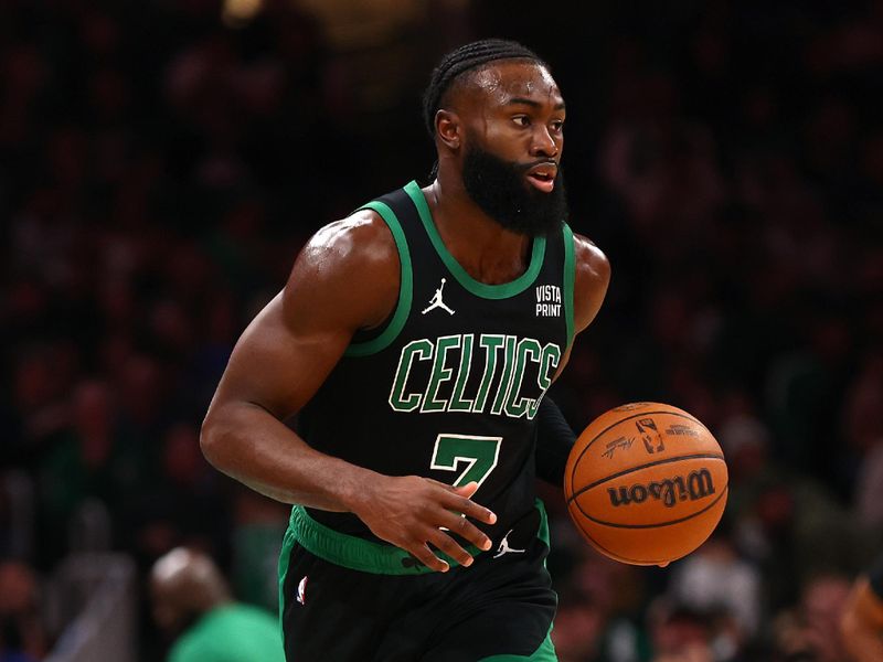 BOSTON, MASSACHUSETTS - DECEMBER 01: Jaylen Brown #7 of the Boston Celtics dribbles against the Philadelphia 76ers during the second quarter at TD Garden on December 01, 2023 in Boston, Massachusetts. NOTE TO USER: User expressly acknowledges and agrees that, by downloading and or using this photograph, User is consenting to the terms and conditions of the Getty Images License Agreement.  (Photo by Maddie Meyer/Getty Images)