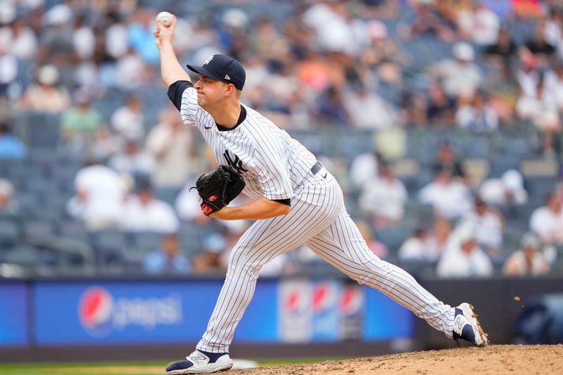 Jul 8, 2023; Bronx, New York, USA; New York Yankees pitcher Michael King (34) pitches against the Chicago Cubs during the ninth inning at Yankee Stadium. Mandatory Credit: Gregory Fisher-USA TODAY Sports