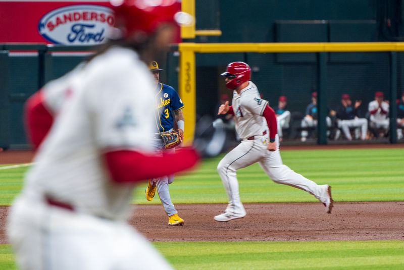 Sep 15, 2024; Phoenix, Arizona, USA; A general view as Arizona Diamondbacks infielder Christian Walker (53) comes in to score after a single by Arizona Diamondbacks infielder Josh Bell (21) in the first inning during a game against the Milwaukee Brewers at Chase Field. Mandatory Credit: Allan Henry-USA TODAY Sports