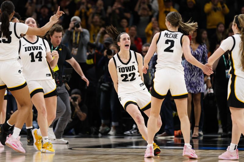 Mar 5, 2023; Minneapolis, MINN, USA; Iowa Hawkeyes guard Caitlin Clark (22) celebrates the win against the Iowa Hawkeyes after the game at Target Center. Mandatory Credit: Matt Krohn-USA TODAY Sports