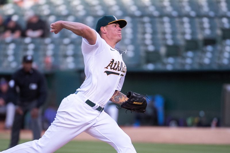 May 21, 2024; Oakland, California, USA; Oakland Athletics pitcher Aaron Brooks (53) throws a pitch against the Colorado Rockies during the third inning at Oakland-Alameda County Coliseum. Mandatory Credit: Ed Szczepanski-USA TODAY Sports