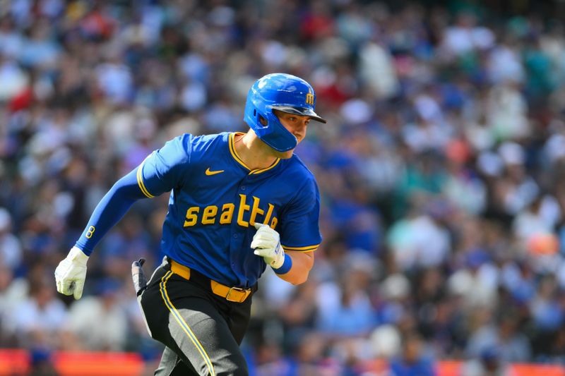Aug 11, 2024; Seattle, Washington, USA; Seattle Mariners right fielder Dominic Canzone (8) runs towards first base after hitting a double against the New York Mets during the second inning at T-Mobile Park. Mandatory Credit: Steven Bisig-USA TODAY Sports