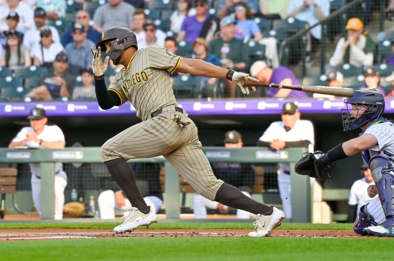 May 10, 2025; Denver, Colorado, USA; San Diego Padres shortstop Xander Bogaerts (2) gets a base hit in the first inning against the Colorado Rockies at Coors Field. Mandatory Credit: John Leyba-Imagn Images