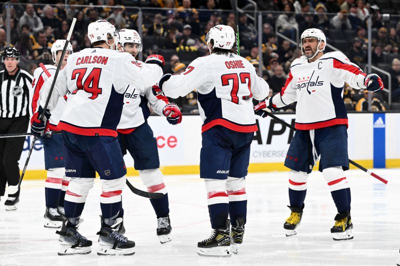 Feb 10, 2024; Boston, Massachusetts, USA; Washington Capitals right wing T.J. Oshie (77) celebrates with his teammates after scoring a goal against the Boston Bruins during the second period at the TD Garden. Mandatory Credit: Brian Fluharty-USA TODAY Sports