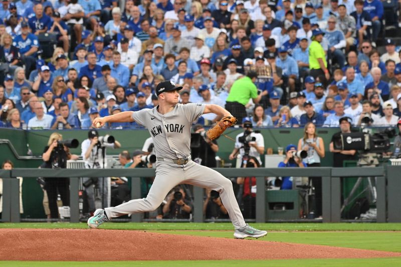 Oct 9, 2024; Kansas City, Missouri, USA; New York Yankees pitcher Clarke Schmidt (36) pitches in the first inning against the Kansas City Royals during game three of the NLDS for the 2024 MLB Playoffs at Kauffman Stadium. Mandatory Credit: Peter Aiken-Imagn Images