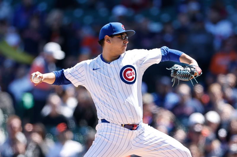 Apr 25, 2024; Chicago, Illinois, USA; Chicago Cubs starting pitcher Javier Assad (72) delivers a pitch against the Houston Astros during the first inning at Wrigley Field. Mandatory Credit: Kamil Krzaczynski-USA TODAY Sports