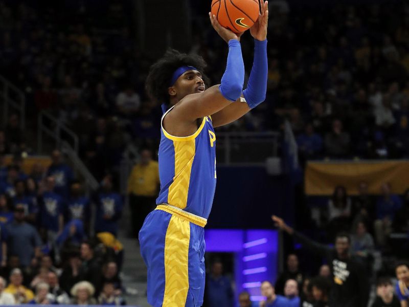 Feb 17, 2024; Pittsburgh, Pennsylvania, USA;  Pittsburgh Panthers forward Blake Hinson (2) shoots a three point basket against the Louisville Cardinals during the first half at the Petersen Events Center. Mandatory Credit: Charles LeClaire-USA TODAY Sports