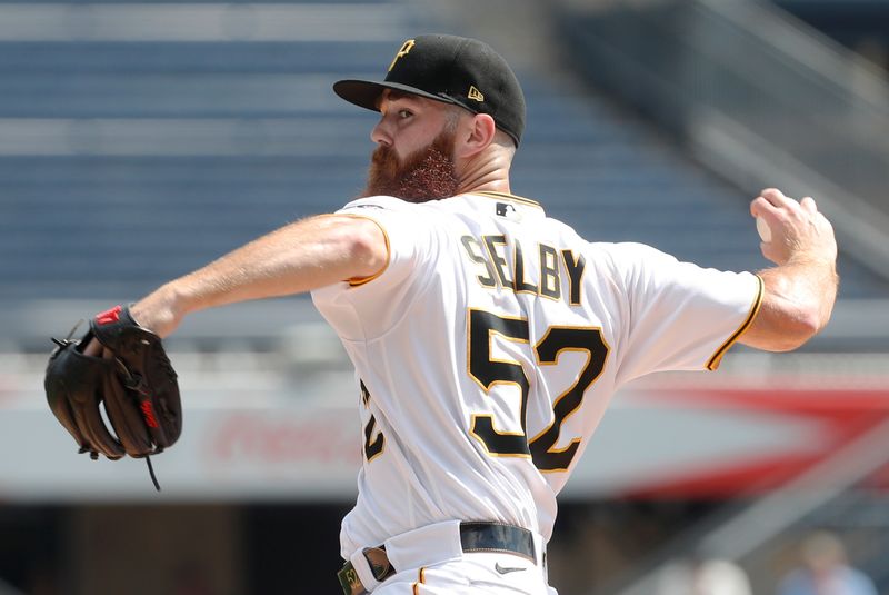 Sep 6, 2023; Pittsburgh, Pennsylvania, USA;  Pittsburgh Pirates starting pitcher Colin Selby (52) delivers a pitch against the Milwaukee Brewers during the first inning at PNC Park. Mandatory Credit: Charles LeClaire-USA TODAY Sports