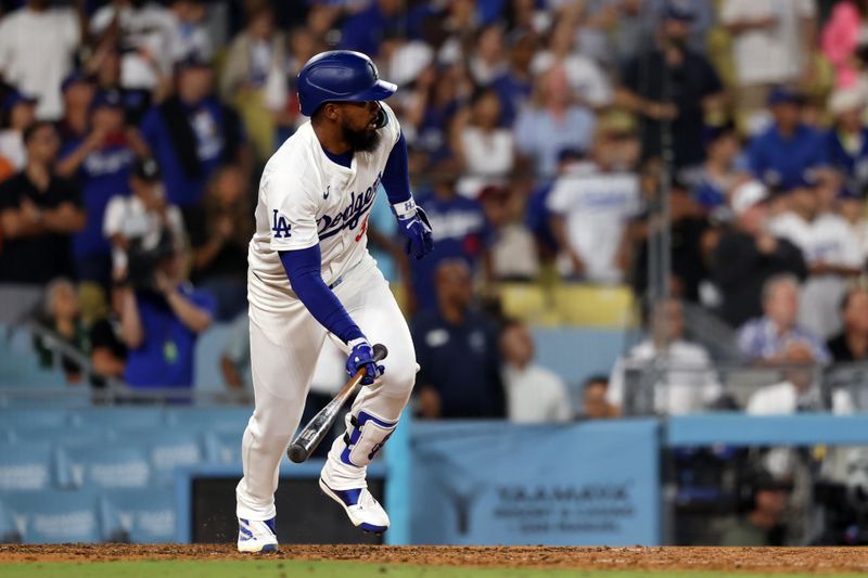 Jul 2, 2024; Los Angeles, California, USA;  Los Angeles Dodgers left fielder Teoscar Hernandez (37) hits a walk off hit to defeat the Arizona Diamondbacks  in bottom of the ninth inning at Dodger Stadium. Mandatory Credit: Kiyoshi Mio-USA TODAY Sports