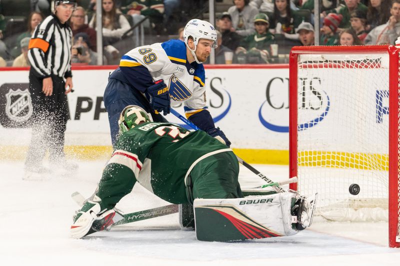 Apr 8, 2023; Saint Paul, Minnesota, USA; St. Louis Blues left wing Pavel Buchnevich (89) scores on Minnesota Wild goaltender Filip Gustavsson (32) in the third period at Xcel Energy Center. Mandatory Credit: Matt Blewett-USA TODAY Sports