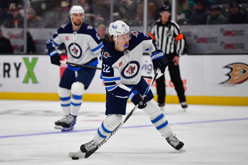 Jan 5, 2024; Anaheim, California, USA; Winnipeg Jets center Mason Appleton (22) shoots on goal against the Anaheim Ducks during the third period at Honda Center. Mandatory Credit: Gary A. Vasquez-USA TODAY Sports