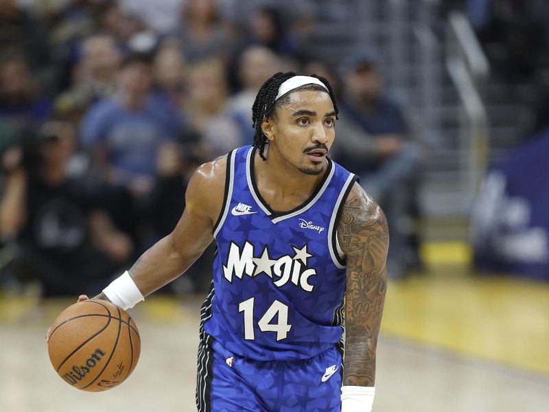 SAN FRANCISCO, CALIFORNIA - JANUARY 02: Gary Harris #14 of the Orlando Magic dribbling the ball looking to pass against the Golden State Warriors during the second quarter of an NBA basketball game at Chase Center on January 02, 2024 in San Francisco, California. NOTE TO USER: User expressly acknowledges and agrees that, by downloading and or using this photograph, User is consenting to the terms and conditions of the Getty Images License Agreement. (Photo by Thearon W. Henderson/Getty Images)