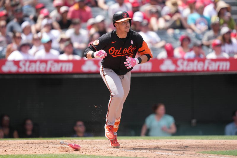 May 11, 2025; Anaheim, California, USA; Baltimore Orioles first baseman Ryan Mountcastle (6) hits a run-scoring single in the fifth inning against the Los Angeles Angels at Angel Stadium. Mandatory Credit: Kirby Lee-Imagn Images