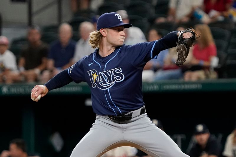 Jul 5, 2024; Arlington, Texas, USA; Tampa Bay Rays pitcher Shane Baz (11) throws to the plate during the first inning against the Tampa Bay Rays at Globe Life Field. Mandatory Credit: Raymond Carlin III-USA TODAY Sports