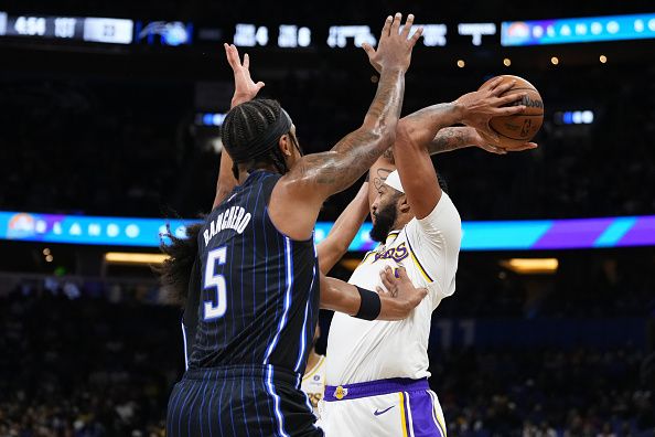 ORLANDO, FLORIDA - NOVEMBER 04: Anthony Davis #3 of the Los Angeles Lakers throws a pass against the Orlando Magic during the first half at Amway Center on November 04, 2023 in Orlando, Florida. NOTE TO USER: User expressly acknowledges and agrees that, by downloading and or using this photograph, User is consenting to the terms and conditions of the Getty Images License Agreement. (Photo by Rich Storry/Getty Images)