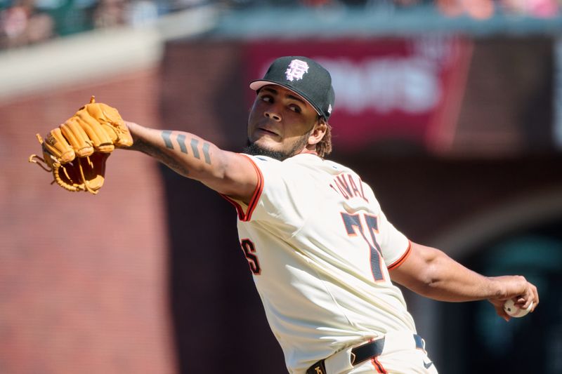 May 12, 2024; San Francisco, California, USA; San Francisco Giants pitcher Camilo Doval (75) throws a pitch against the Cincinnati Reds during the eighth inning at Oracle Park. Mandatory Credit: Robert Edwards-USA TODAY Sports