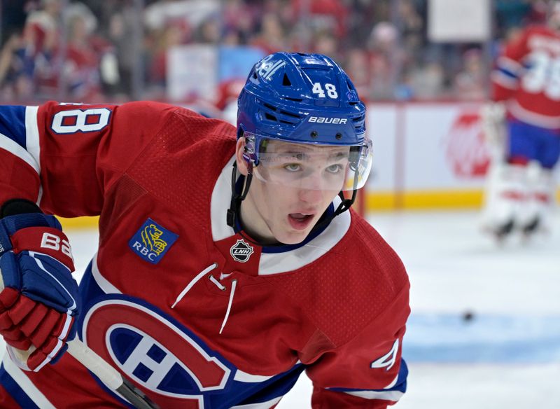 Apr 16, 2024; Montreal, Quebec, CAN; Montreal Canadiens defenseman Lane Hutson (48) during the warmup period before the game against the Detroit Red Wings at the Bell Centre. Mandatory Credit: Eric Bolte-USA TODAY Sports