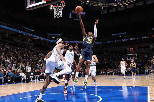 MINNEAPOLIS, MN -  DECEMBER 16: Bennedict Mathurin #00 of the Indiana Pacers drives to the basket during the game against the Minnesota Timberwolves on December 16 , 2023 at Target Center in Minneapolis, Minnesota. NOTE TO USER: User expressly acknowledges and agrees that, by downloading and or using this Photograph, user is consenting to the terms and conditions of the Getty Images License Agreement. Mandatory Copyright Notice: Copyright 2023 NBAE (Photo by David Sherman/NBAE via Getty Images)