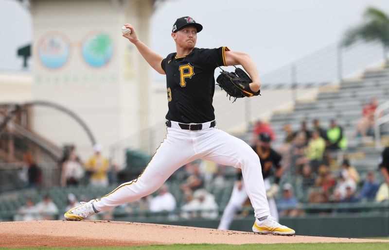 Mar 5, 2025; Bradenton, Florida, USA;  Pittsburgh Pirates starting pitcher Mitch Keller (23) throws a pitch during the first inning against the Toronto Blue Jays at LECOM Park. Mandatory Credit: Kim Klement Neitzel-Imagn Images