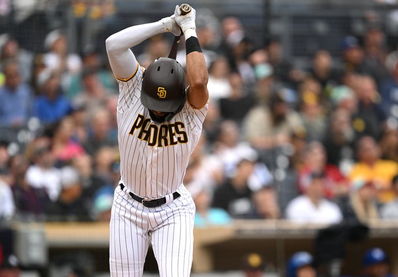 May 17, 2023; San Diego, California, USA; San Diego Padres right fielder Fernando Tatis Jr. (23) slams his bat after flying out to end the eighth inning against the Kansas City Royals at Petco Park. Mandatory Credit: Orlando Ramirez-USA TODAY Sports