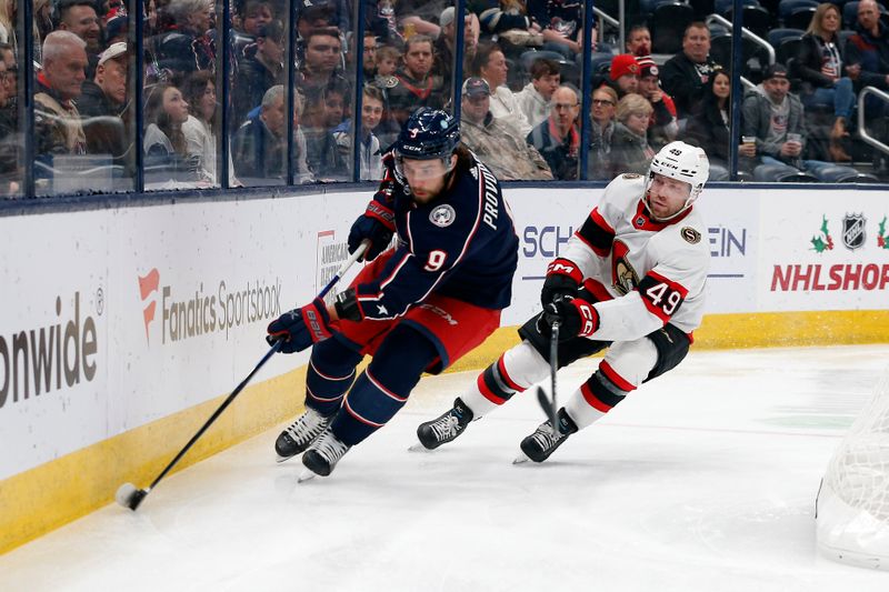 Dec 1, 2023; Columbus, Ohio, USA; Columbus Blue Jackets defenseman Ivan Provorov (9) and Ottawa Senators center Rourke Chartier (49) chase down loose puck during the first period at Nationwide Arena. Mandatory Credit: Russell LaBounty-USA TODAY Sports