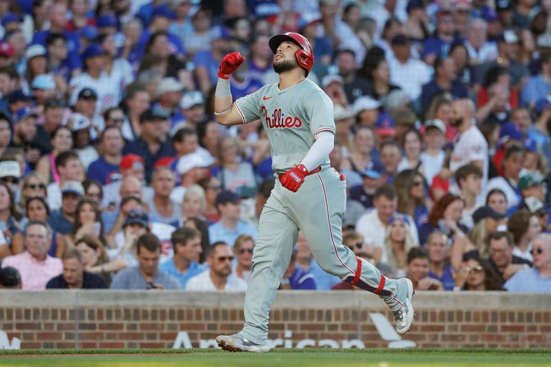 Jul 3, 2024; Chicago, Illinois, USA; Philadelphia Phillies catcher Rafael Marchan (13) rounds the bases after hitting a solo home run against the Chicago Cubs during the third inning at Wrigley Field. Mandatory Credit: Kamil Krzaczynski-USA TODAY Sports