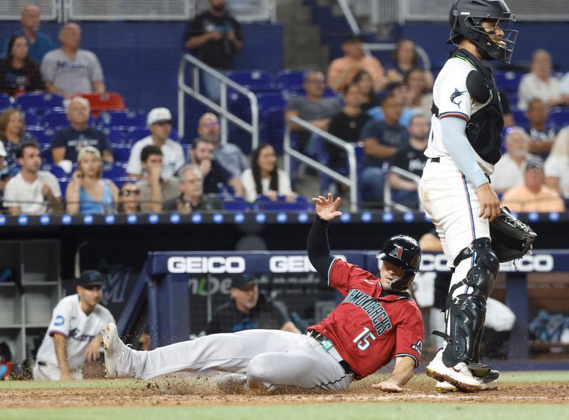 Aug 21, 2024; Miami, Florida, USA;  Arizona Diamondbacks right fielder Randal Grichuk (15) scores against the Miami Marlins in the seventh inning at loanDepot Park. Mandatory Credit: Rhona Wise-USA TODAY Sports