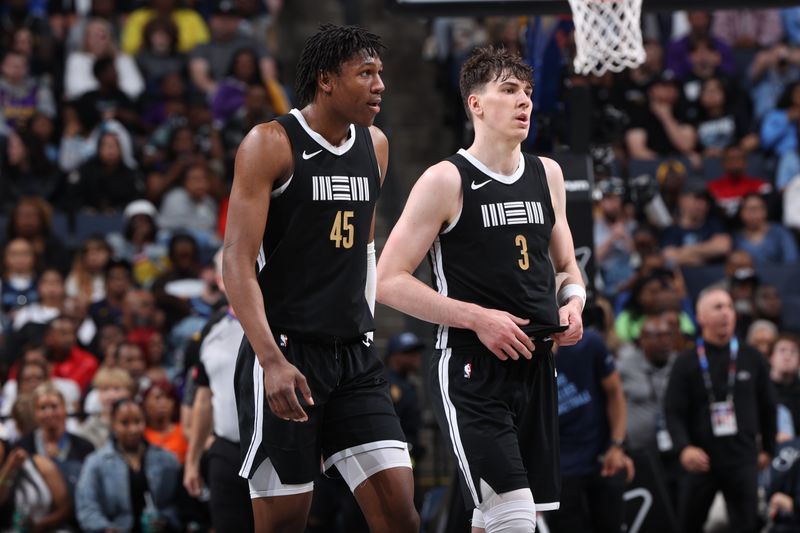 MEMPHIS, TN - APRIL 12: Jake LaRavia #3 GG Jackson #45 of the Memphis Grizzlies looks on during the game against the Los Angeles Lakers on April 12, 2024 at FedExForum in Memphis, Tennessee. NOTE TO USER: User expressly acknowledges and agrees that, by downloading and or using this photograph, User is consenting to the terms and conditions of the Getty Images License Agreement. Mandatory Copyright Notice: Copyright 2024 NBAE (Photo by Joe Murphy/NBAE via Getty Images)