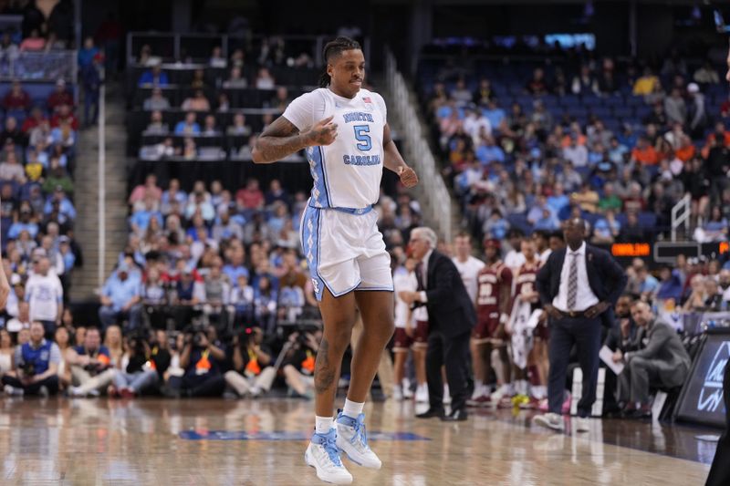 Mar 8, 2023; Greensboro, NC, USA; North Carolina Tar Heels forward Armando Bacot (5) hops off after being injured in the first half of the second round at Greensboro Coliseum. Mandatory Credit: Bob Donnan-USA TODAY Sports