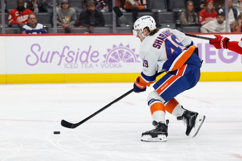 Nov 20, 2025; Detroit, Michigan, USA;  New York Islanders right wing Max Shabanov (49) skates with the puck in the third period against the Detroit Red Wings at Little Caesars Arena. Mandatory Credit: Rick Osentoski-Imagn Images