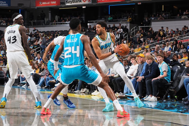 INDIANAPOLIS, IN - DECEMBER 8: Tyrese Haliburton #0 of the Indiana Pacers handles the ball during the game against the Charlotte Hornets on December 8, 2024 at Gainbridge Fieldhouse in Indianapolis, Indiana. NOTE TO USER: User expressly acknowledges and agrees that, by downloading and or using this Photograph, user is consenting to the terms and conditions of the Getty Images License Agreement. Mandatory Copyright Notice: Copyright 2024 NBAE (Photo by Ron Hoskins/NBAE via Getty Images)