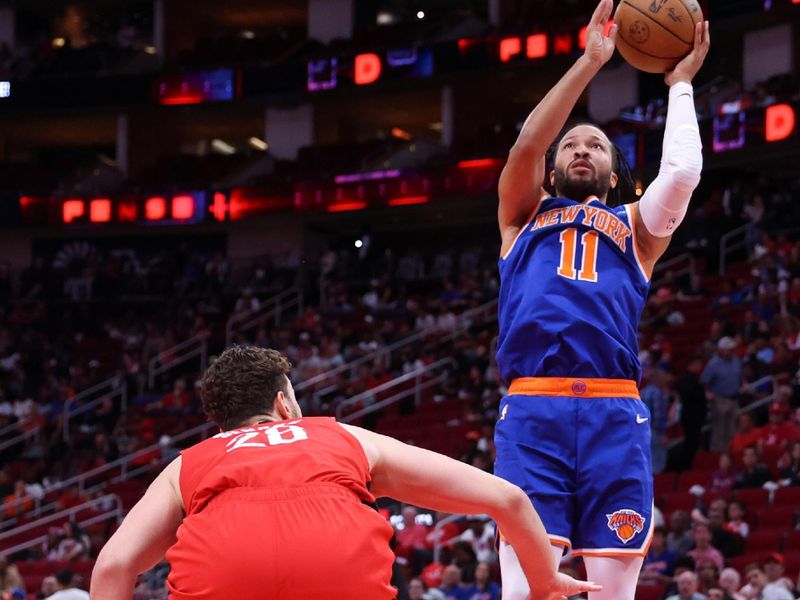 HOUSTON, TX - NOVEMBER 4: Jalen Brunson #11 of the New York Knicks drives to the basket during the game against the Houston Rockets on November 4, 2024 at the Toyota Center in Houston, Texas. NOTE TO USER: User expressly acknowledges and agrees that, by downloading and or using this photograph, User is consenting to the terms and conditions of the Getty Images License Agreement. Mandatory Copyright Notice: Copyright 2024 NBAE (Photo by Michael Starghill Jr./NBAE via Getty Images)