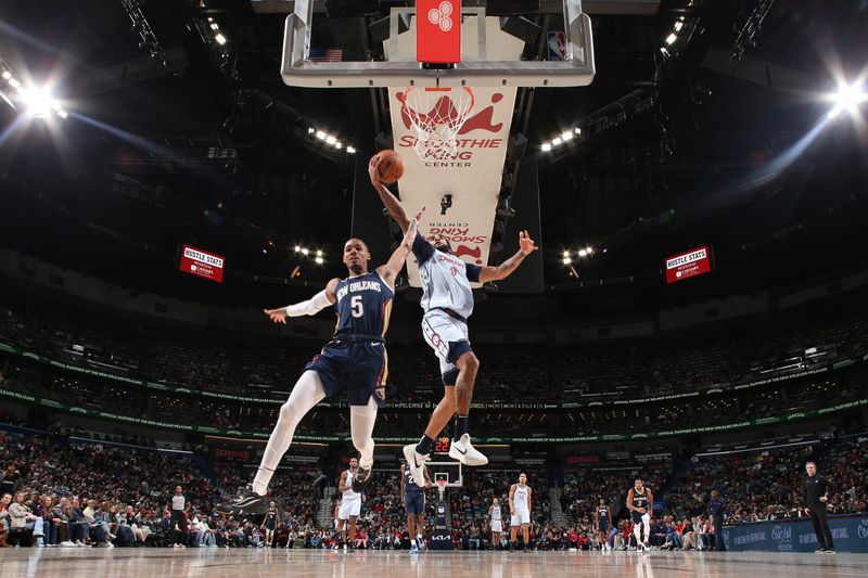 NEW ORLEANS, LA - JANUARY 3:  Justin Champagnie #9 of the Washington Wizards drives to the basket during the game against the New Orleans Pelicans on January 3, 2025 at the Smoothie King Center in New Orleans, Louisiana. NOTE TO USER: User expressly acknowledges and agrees that, by downloading and or using this Photograph, user is consenting to the terms and conditions of the Getty Images License Agreement. Mandatory Copyright Notice: Copyright 2025 NBAE (Photo by Layne Murdoch Jr./NBAE via Getty Images)