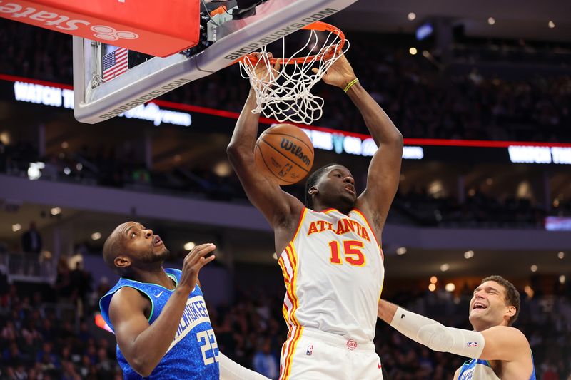 MILWAUKEE, WISCONSIN - DECEMBER 02: Clint Capela #15 of the Atlanta Hawks dunks during the second half of a game against the Milwaukee Bucks at Fiserv Forum on December 02, 2023 in Milwaukee, Wisconsin. NOTE TO USER: User expressly acknowledges and agrees that, by downloading and or using this photograph, User is consenting to the terms and conditions of the Getty Images License Agreement. (Photo by Stacy Revere/Getty Images)