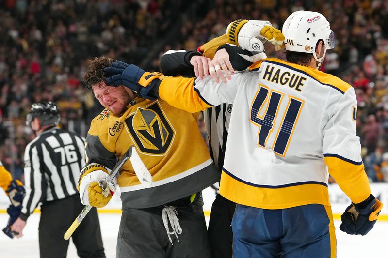 Jan 17, 2026; Las Vegas, Nevada, USA; Nashville Predators defenseman Nicolas Hague (41) shoves Vegas Golden Knights defenseman Jeremy Lauzon (5) during the second period at T-Mobile Arena. Mandatory Credit: Stephen R. Sylvanie-Imagn Images