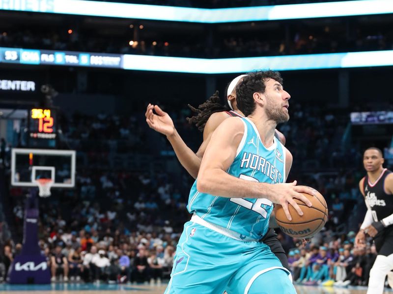 CHARLOTTE, NC - MARCH 31:  Vasilije Micic #22 of the Charlotte Hornets  drives to the basket during the game against the LA Clippers on March 31, 2024 at Spectrum Center in Charlotte, North Carolina. NOTE TO USER: User expressly acknowledges and agrees that, by downloading and or using this photograph, User is consenting to the terms and conditions of the Getty Images License Agreement.  Mandatory Copyright Notice:  Copyright 2024 NBAE (Photo by Brock Williams-Smith/NBAE via Getty Images)