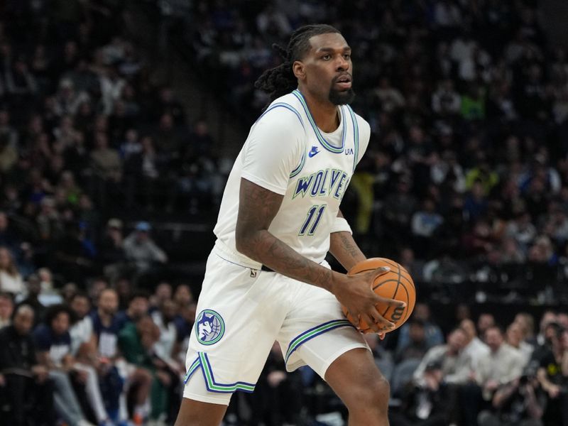 MINNEAPOLIS, MN -  FEBRUARY 23: Naz Reid #11 of the Minnesota Timberwolves handles the ball during the game against the Milwaukee Bucks on February 23, 2024 at Target Center in Minneapolis, Minnesota. NOTE TO USER: User expressly acknowledges and agrees that, by downloading and or using this Photograph, user is consenting to the terms and conditions of the Getty Images License Agreement. Mandatory Copyright Notice: Copyright 2024 NBAE (Photo by Jordan Johnson/NBAE via Getty Images)