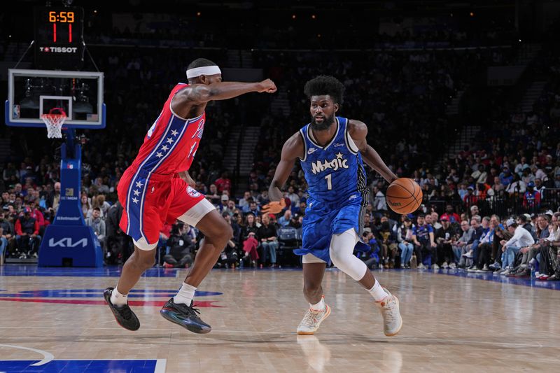 PHILADELPHIA, PA - APRIL 12: Jonathan Isaac #1 of the Orlando Magic dribbles the ball during the game against the Philadelphia 76ers on April 12, 2024 at the Wells Fargo Center in Philadelphia, Pennsylvania NOTE TO USER: User expressly acknowledges and agrees that, by downloading and/or using this Photograph, user is consenting to the terms and conditions of the Getty Images License Agreement. Mandatory Copyright Notice: Copyright 2024 NBAE (Photo by Jesse D. Garrabrant/NBAE via Getty Images)