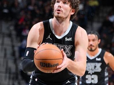 SAN ANTONIO, TX - DECEMBER 26: Cedi Osman #16 of the San Antonio Spurs shoots a free throw during the game against the Utah Jazz on December 26, 2023 at the Frost Bank Center in San Antonio, Texas. NOTE TO USER: User expressly acknowledges and agrees that, by downloading and or using this photograph, user is consenting to the terms and conditions of the Getty Images License Agreement. Mandatory Copyright Notice: Copyright 2023 NBAE (Photos by Michael Gonzales/NBAE via Getty Images)