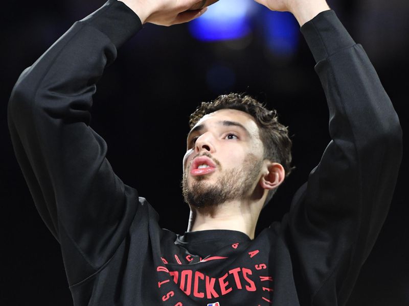 LAS VEGAS, NV - DECEMBER 14: Alperen Sengun #28 of the Houston Rockets warms up before the game against the Oklahoma City Thunder during the Emirates NBA Cup Semifinal game on December 14, 2024 at T-Mobile Arena in Las Vegas, Nevada. NOTE TO USER: User expressly acknowledges and agrees that, by downloading and/or using this Photograph, user is consenting to the terms and conditions of the Getty Images License Agreement. Mandatory Copyright Notice: Copyright 2024 NBAE (Photo by Logan Riely/NBAE via Getty Images)