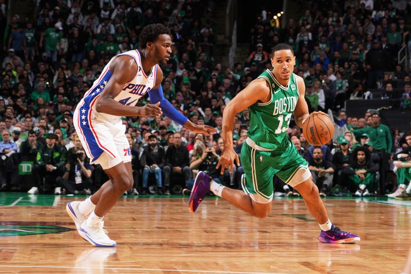 BOSTON, MA - MAY 3: Malcolm Brogdon #13 of the Boston Celtics drives to the basket during Round 2 Game 2 of the Eastern Conference Semi-Finals 2023 NBA Playoffs on May 3, 2023 at the TD Garden in Boston, Massachusetts. NOTE TO USER: User expressly acknowledges and agrees that, by downloading and or using this photograph, User is consenting to the terms and conditions of the Getty Images License Agreement. Mandatory Copyright Notice: Copyright 2023 NBAE  (Photo by Jesse D. Garrabrant/NBAE via Getty Images)