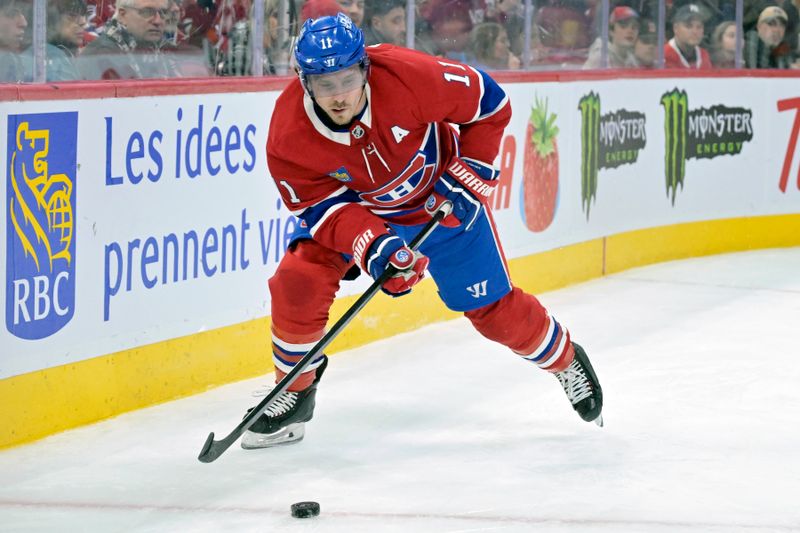 Jan 25, 2025; Montreal, Quebec, CAN; Montreal Canadiens forward Brendan Gallagher (11) plays the puck during the second period of the game against the New Jersey Devils at the Bell Centre. Mandatory Credit: Eric Bolte-Imagn Images