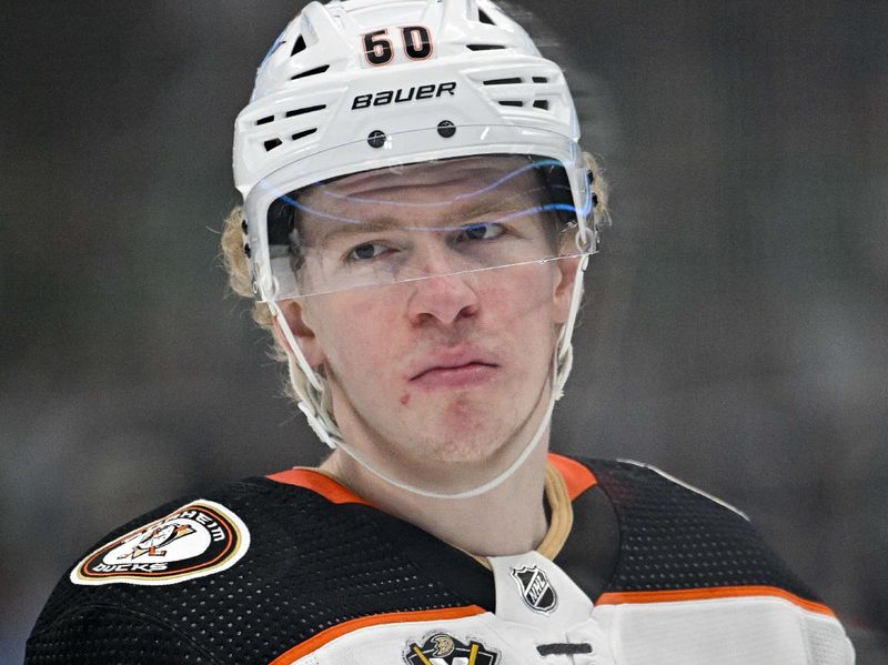 Jan 25, 2024; Dallas, Texas, USA; Anaheim Ducks defenseman Jackson LaCombe (60) waits for the face-off against the Dallas Stars during the first period at the American Airlines Center. Mandatory Credit: Jerome Miron-USA TODAY Sports