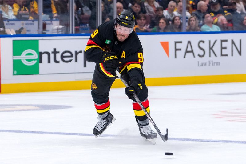 Jan 25, 2025; Vancouver, British Columbia, CAN; Vancouver Canucks forward J.T. Miller (9) makes a pass against the Washington Capitals in the second period at Rogers Arena. Mandatory Credit: Bob Frid-Imagn Images