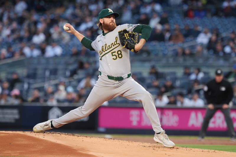 Apr 23, 2024; Bronx, New York, USA; Oakland Athletics pitcher Paul Blackburn (58) delivers a pitch during the first inning against the New York Yankees at Yankee Stadium. Mandatory Credit: Vincent Carchietta-USA TODAY Sports