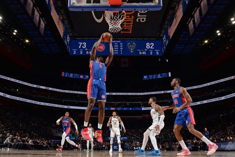 DETROIT, MI - JANUARY 20: Jalen Duren #0 of the Detroit Pistons rebounds during the game against the Milwaukee Bucks on January 20, 2024 at Little Caesars Arena in Detroit, Michigan. NOTE TO USER: User expressly acknowledges and agrees that, by downloading and/or using this photograph, User is consenting to the terms and conditions of the Getty Images License Agreement. Mandatory Copyright Notice: Copyright 2024 NBAE (Photo by Chris Schwegler/NBAE via Getty Images)