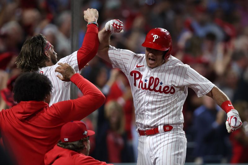 Oct 4, 2023; Philadelphia, Pennsylvania, USA; Philadelphia Phillies catcher J.T. Realmuto (10) reacts after hitting a solo home run against the Miami Marlins during the fourth inning for game two of the Wildcard series for the 2023 MLB playoffs at Citizens Bank Park. Mandatory Credit: Bill Streicher-USA TODAY Sports