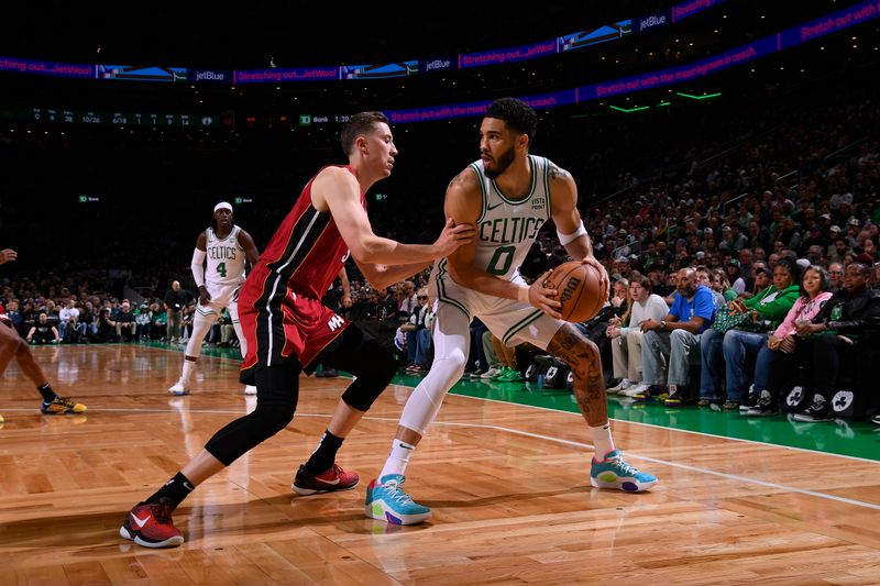 BOSTON, MA - APRIL 21: Jayson Tatum #0 of the Boston Celtics handles the ball during the game against the Miami Heat during Round 1 Game 1 of the 2024 NBA Playoffs on April 21, 2024 at the TD Garden in Boston, Massachusetts. NOTE TO USER: User expressly acknowledges and agrees that, by downloading and or using this photograph, User is consenting to the terms and conditions of the Getty Images License Agreement. Mandatory Copyright Notice: Copyright 2024 NBAE  (Photo by Brian Babineau/NBAE via Getty Images)