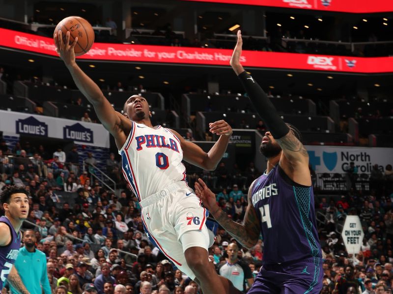 CHARLOTTE, NC - DECEMBER 3: Tyrese Maxey #0 of the Philadelphia 76ers drives to the basket during the game against the Charlotte Hornets during an NBA Emirates Cup game on December 3, 2024 at Spectrum Center in Charlotte, North Carolina. NOTE TO USER: User expressly acknowledges and agrees that, by downloading and or using this photograph, User is consenting to the terms and conditions of the Getty Images License Agreement. Mandatory Copyright Notice: Copyright 2024 NBAE (Photo by Kent Smith/NBAE via Getty Images)